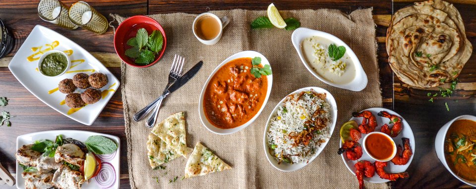 Crisp naan and curries served in a relaxed space.