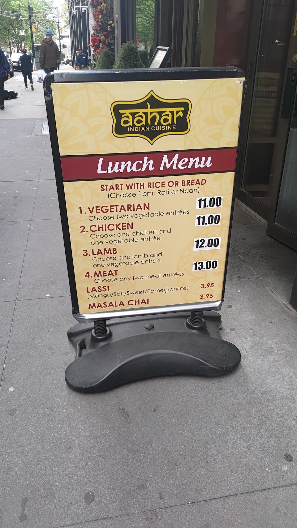 Restaurant menu featuring classic curries and breads.