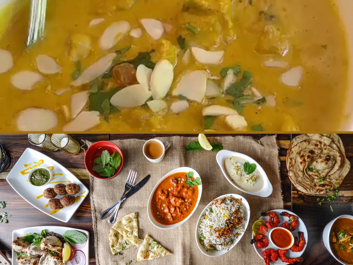 Warm plated Indian dishes on a restaurant table.